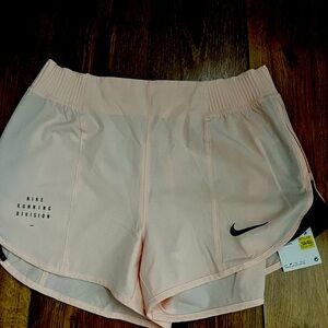Nike running shorts size medium! Never worn with tags!